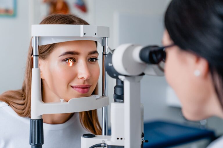 eye doctor with female patient during an examinati 2022 05 31 02 23 21 utc